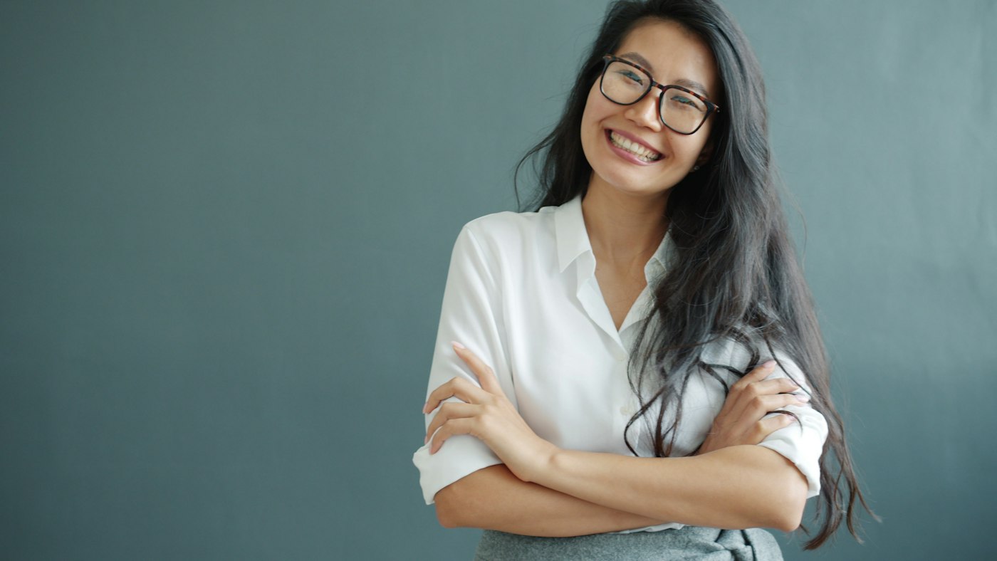 A smiling clinic owner